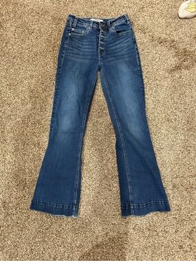 High-Rise Dark Blue Flare Jeans with Button Fly